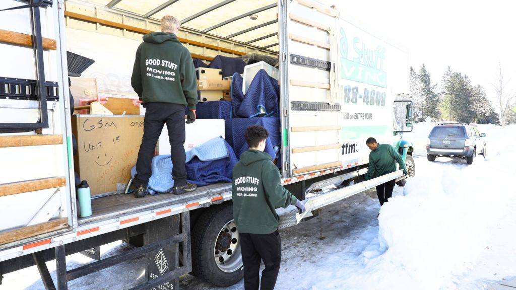 good stuff team members prepping a moving truck