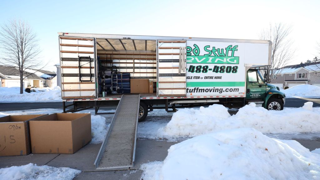 good stuff moving truck parked outside a house