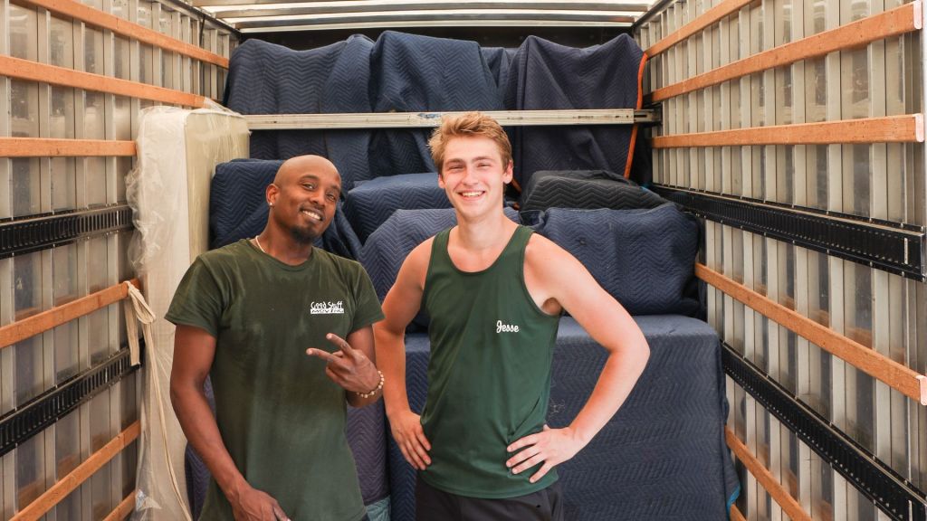Minnesota Moving Company Awarded Super Service Award 7 two good stuff moving crew member posing and smiling
