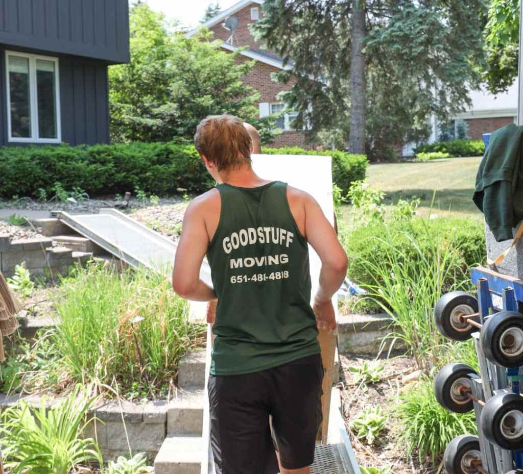 a man carrying a sign