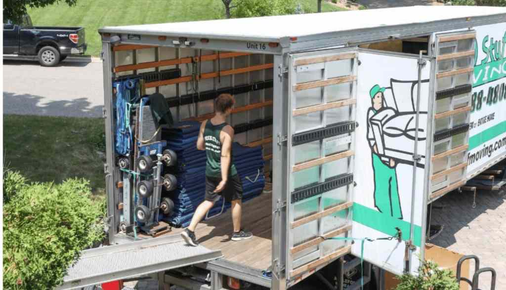 cross country moving cost 2026, moving truck being loaded for a long distance move